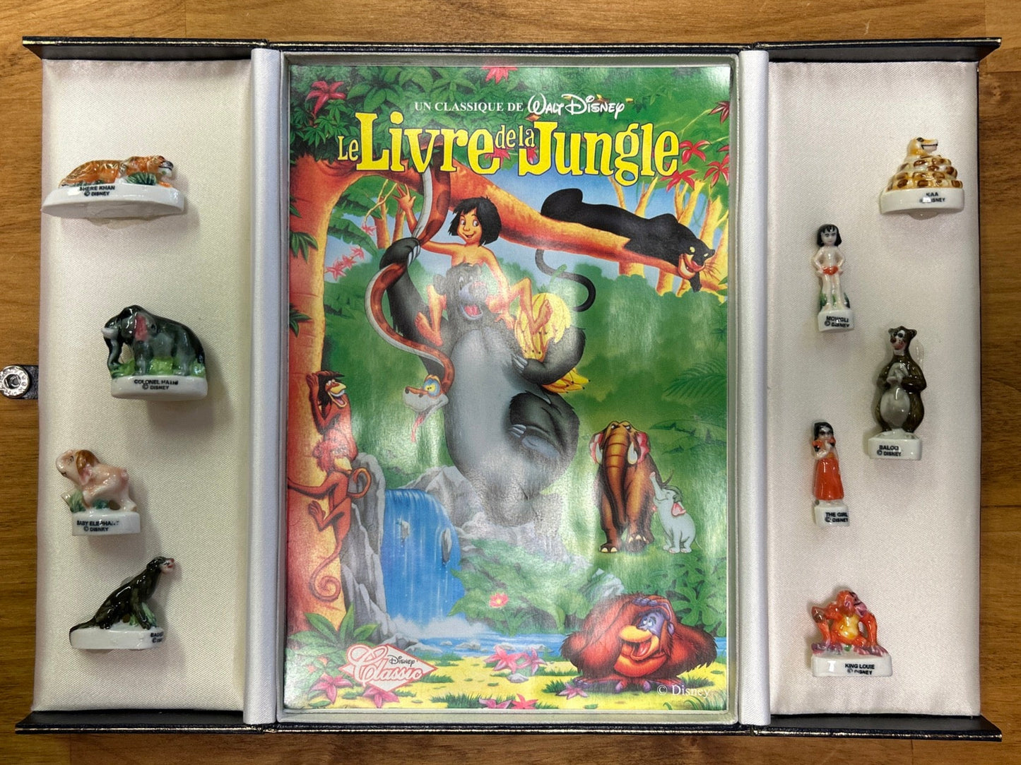 Jungle Book - 9 Rare French porcelain Figurines in folding box with VHS advertisement