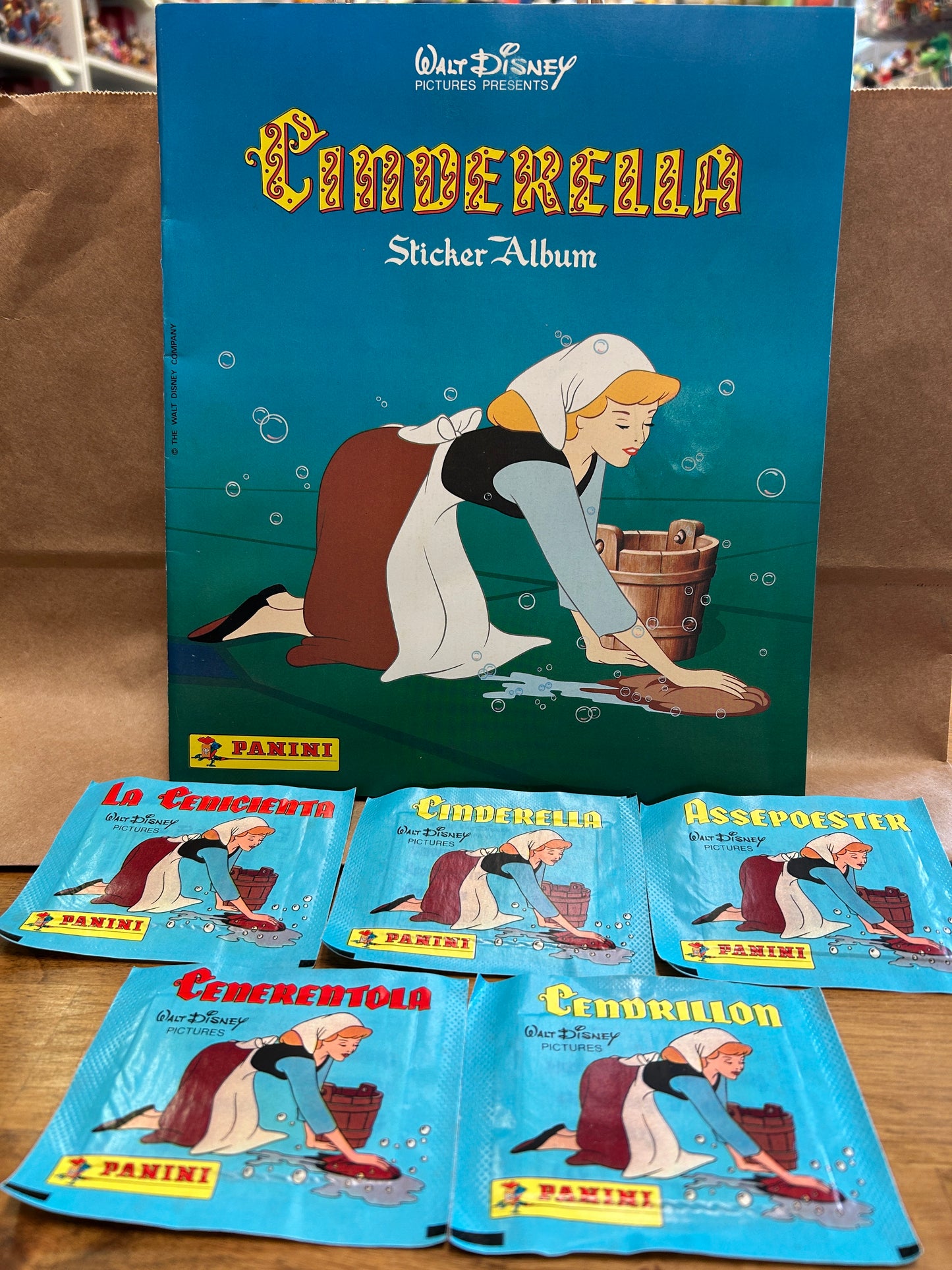 6 unopened packs of CINDERELLA Pamini Album Stickers and Sticker Book