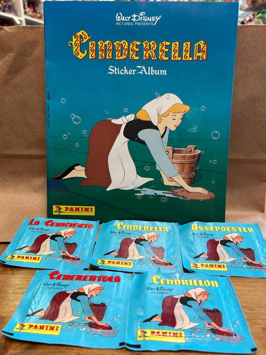 6 unopened packs of CINDERELLA Pamini Album Stickers and Sticker Book