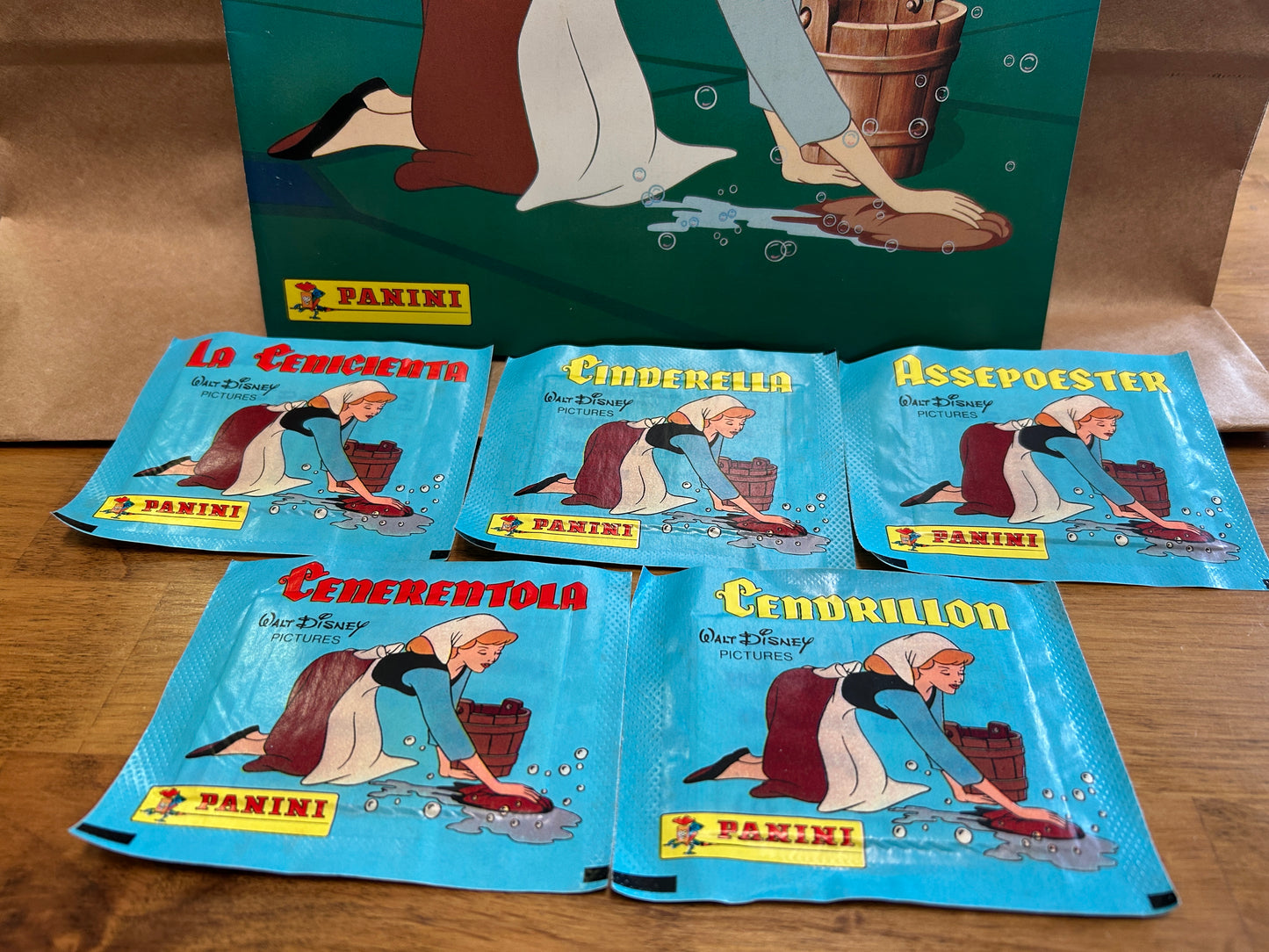 6 unopened packs of CINDERELLA Pamini Album Stickers and Sticker Book